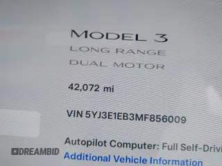 2021 Tesla Model 3 Long Range with VIN 5YJ3E1EB3MF856009, listed as a IAAI auction lot 41809767 with 42,072 mi miles. Bid and sale history available at carsss.com. Image 16.