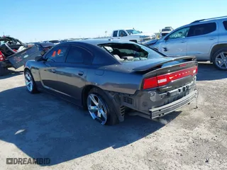 2013 Dodge Charger RT Max with VIN 2C3CDXCT4DH580262, listed as a IAAI auction lot 41252672 with 103,276 mi miles. Bid and sale history available at carsss.com. Image 3.