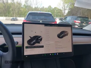 2023 Tesla Model Y Performance z VIN 7SAYGDEFXPF767971, wystawiony jako IAAI lot #42198881 z przebiegiem 32 442 mil mil oraz . Historia ofert i sprzedaży dostępna na DreamBid. Obrazek 18.