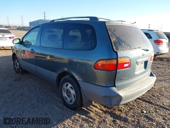 2000 Toyota Sienna CE with VIN 4T3GF19C2YU240254, listed as a IAAI auction lot 40688669 with 1 mi miles. Bid and sale history available at carsss.com. Image 3.