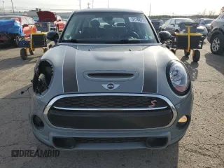 2018 MINI Hardtop 4 Door Cooper S с VIN WMWXU3C58J2F50385, выставлен на аукционе Copart как лот 51168775 с пробегом 77 091 миль миль и Списание • Salvage title. История ставок и продаж доступна на DreamBid. Изображение 5.
