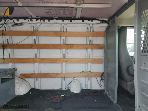 2015 GMC Savana Cargo Van with VIN 1GTW7FCF1F1906993, listed as a Copart auction lot 74488504 with 163,150 mi miles and Salvage Title. Bid and sale history available at carsss.com. Image 11.