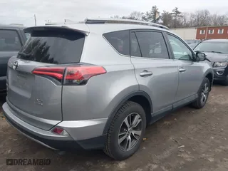 2017 Toyota RAV4 XLE with VIN 2T3RFREV8HW647462, listed as a IAAI auction lot 41678968 with 99,837 mi miles. Bid and sale history available at carsss.com. Image 4.