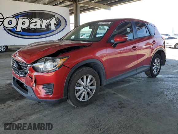 2016 Mazda CX-5 Sport with VIN JM3KE2BY8G0837203, listed as a Copart auction lot 54960845 with 116,656 mi miles and Salvage title. Bid and sale history available at DreamBid. Image 1.