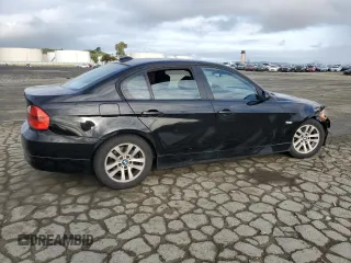 2007 BMW 3 Series 328i with VIN WBAVA37507NL12948, listed as a Copart auction lot 50275915 with 357,156 mi miles and Salvage title. Bid and sale history available at DreamBid. Image 3.
