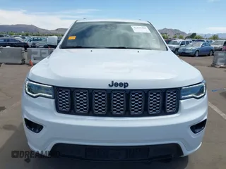 2021 Jeep Grand Cherokee Laredo E with VIN 1C4RJEAG2MC785168, listed as a IAAI auction lot 42115460 with 64,036 mi miles and . Bid and sale history available at DreamBid. Image 13.