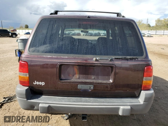 1997 Jeep Grand Cherokee Laredo with VIN 1J4GZ58S1VC747713, listed as a Copart auction lot 55290275 with 159,846 mi miles and Salvage title. Bid and sale history available at DreamBid. Image 6.