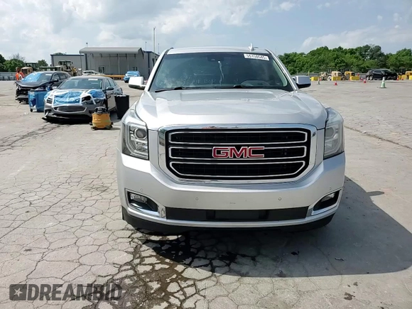 2017 GMC Yukon SLT z VIN 1GKS1BKC4HR375877, wystawiony jako Copart lot #55150545 z przebiegiem 144 788 mil mil oraz Szkoda całkowita • Salvage title. Historia ofert i sprzedaży dostępna na DreamBid. Obrazek 14.
