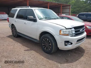 2015 Ford Expedition XLT z VIN 1FMJU1HT7FEF32897, wystawiony jako IAAI lot #42398775 z przebiegiem 157 508 mil mil oraz . Historia ofert i sprzedaży dostępna na DreamBid. Obrazek 1.