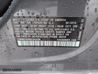 2013 Volkswagen Passat SE w/Sunroof with VIN 1VWBH7A38DC002096, listed as a IAAI auction lot 41904594 with 134,738 mi miles. Bid and sale history available at carsss.com. Image 9.