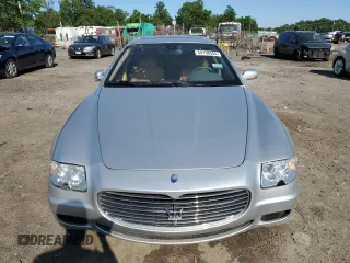 2005 Maserati Quattroporte z VIN ZAMCE39AX50019962, wystawiony jako Copart lot #59158555 z przebiegiem 24 013 mil mil oraz Czysty tytuł • Clean title. Historia ofert i sprzedaży dostępna na DreamBid. Obrazek 6.