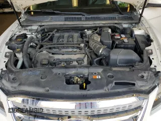 2012 Ford Taurus SEL z VIN 1FAHP2HW8CG133657, wystawiony jako Copart lot #52865895 z przebiegiem 132 876 mil mil oraz Szkoda całkowita • Salvage title. Historia ofert i sprzedaży dostępna na DreamBid. Obrazek 12.