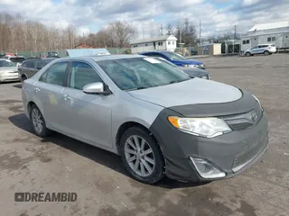 2014 Toyota Camry L with VIN 4T4BF1FK8ER387050, listed as a IAAI auction lot 41453516 with 184,150 mi miles. Bid and sale history available at carsss.com. Image 1.