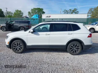 2021 Volkswagen Tiguan SE with VIN 3VV2B7AX6MM139903, listed as a IAAI auction lot 42060657 with 42,747 mi miles and . Bid and sale history available at DreamBid. Image 14.