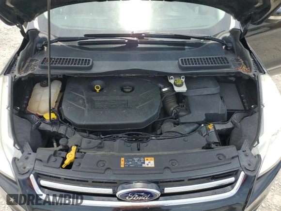 2014 Ford Escape Titanium с VIN 1FMCU0J9XEUA27152, выставлен на аукционе Copart как лот 60246715 с пробегом 182 550 миль миль и Чистый • Clean title. История ставок и продаж доступна на DreamBid. Изображение 12.