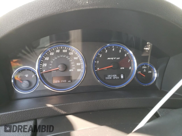 2008 Jeep Grand Cherokee SRT-8 with VIN 1J8HR78358C192213, listed as a Copart auction lot 63658294 with 126,140 mi miles and Salvage Title. Bid and sale history available at carsss.com. Image 9.