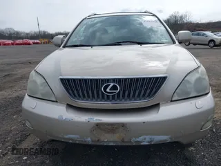 2005 Lexus RX 330 with VIN 2T2HA31U65C047755, listed as a IAAI auction lot 42043942 with 301,840 mi miles. Bid and sale history available at carsss.com. Image 6.