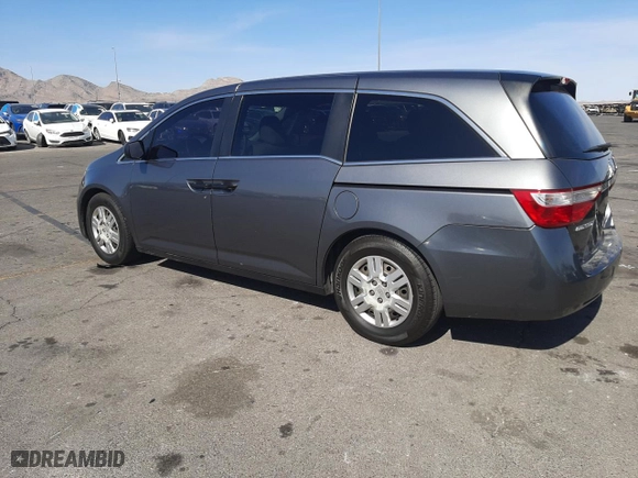 2012 Honda Odyssey LX with VIN 5FNRL5H24CB019934, listed as a Copart auction lot 52412605 with 157,725 mi miles and Salvage Title. Bid and sale history available at carsss.com. Image 2.