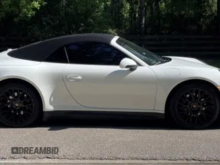 2014 Porsche 911 Carrera z VIN WP0CA2A92ES140453, wystawiony jako IAAI lot #42302853 z przebiegiem 47 879 mil mil oraz . Historia ofert i sprzedaży dostępna na DreamBid. Obrazek 14.