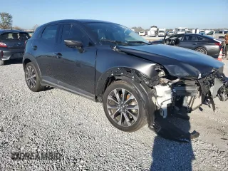 2019 Mazda CX-3 Grand Touring with VIN JM1DKFD77K0447529, listed as a Copart auction lot 43562565 with 57,321 mi miles and Salvage Title. Bid and sale history available at DreamBid. Image 4.