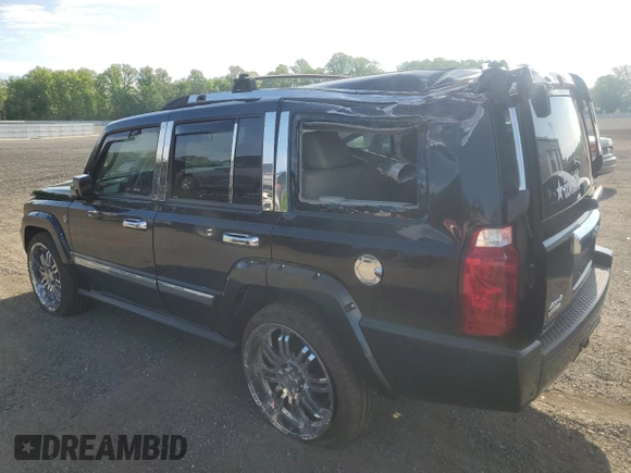 2010 Jeep Commander Limited with VIN 1J4RG5GT1AC129682, listed as a Copart auction lot 55215375 with 36,906 mi miles and Salvage title. Bid and sale history available at DreamBid. Image 2.