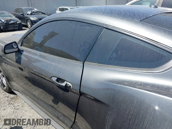 2015 Ford Mustang EcoBoost z VIN 1FA6P8TH4F5420173, wystawiony jako IAAI lot #42236518 z przebiegiem Nie podano mil oraz . Historia ofert i sprzedaży dostępna na DreamBid. Obrazek 14.