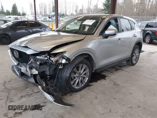 2020 Mazda CX-5 Grand Touring with VIN JM3KFADM0L0738693, listed as a IAAI auction lot 41725906 with 63,629 mi miles. Bid and sale history available at carsss.com. Image 18.