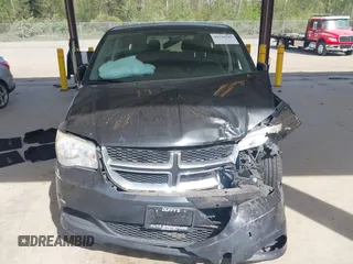 2012 Dodge Grand Caravan SE with VIN 2C4RDGBG9CR351921, listed as a IAAI auction lot 42110545 with 89,194 mi miles and . Bid and sale history available at DreamBid. Image 11.