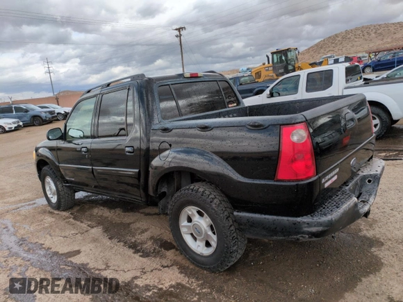 2001 Ford Explorer Sport Trac z VIN 1FMZU77E81UC59699, wystawiony jako Copart lot #50420055 z przebiegiem 236 138 mil mil oraz Szkoda całkowita • Salvage title. Historia ofert i sprzedaży dostępna na DreamBid. Obrazek 2.
