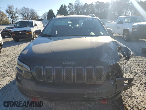 2022 Jeep Cherokee Trailhawk with VIN 1C4PJMBX5ND549237, listed as a Copart auction lot 83760264 with 24,756 mi miles and Salvage Title. Bid and sale history available at carsss.com. Image 5.