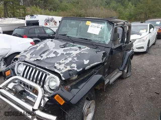 2004 Jeep Wrangler Sahara with VIN 1J4FA59S84P701479, listed as a IAAI auction lot 41721789 with 190,914 mi miles. Bid and sale history available at carsss.com. Image 19.