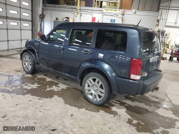 2008 Dodge Nitro SLT with VIN 1D8GU58K68W223532, listed as a IAAI auction lot 41259900 with 156,956 mi miles. Bid and sale history available at carsss.com. Image 3.