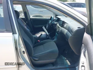 2006 Toyota Corolla CE z VIN 2T1BR32E96C677488, wystawiony jako IAAI lot #42286785 z przebiegiem 193 214 mil mil oraz . Historia ofert i sprzedaży dostępna na DreamBid. Obrazek 5.