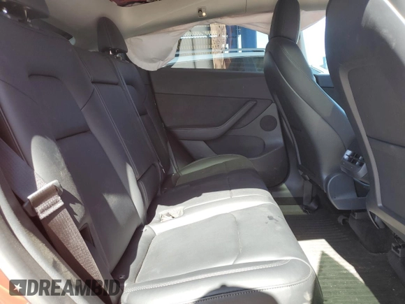 2022 Tesla Model Y Long Range z VIN 7SAYGDEE3NF436119, wystawiony jako Copart lot #54892115 z przebiegiem 27 054 mil mil oraz Szkody całkowita. Historia ofert i sprzedaży dostępna na DreamBid. Obrazek 10.