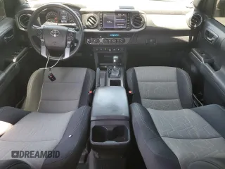 2022 Toyota Tacoma SR with VIN 3TMCZ5AN5NM482575, listed as a Copart auction lot 61498025 with 49,046 mi miles and Salvage title. Bid and sale history available at DreamBid. Image 8.