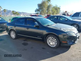2010 Ford Fusion Hybrid with VIN 3FADP0L32AR149911, listed as a IAAI auction lot 41636037 with 148,431 mi miles. Bid and sale history available at carsss.com. Image 14.