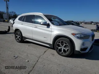 2018 BMW X1 xDrive28i z VIN WBXHT3C3XJ5K32176, wystawiony jako Copart lot #88102885 z przebiegiem 130 394 mil mil oraz Szkoda całkowita • Salvage title. Historia ofert i sprzedaży dostępna na DreamBid. Obrazek 4.