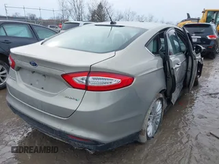 2015 Ford Fusion S Hybrid with VIN 3FA6P0UU4FR111409, listed as a IAAI auction lot 41447316 with 150,068 mi miles. Bid and sale history available at carsss.com. Image 4.