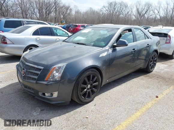 2009 Cadillac CTS RWD z VIN 1G6DF577790133127, wystawiony jako IAAI lot #41810358 z przebiegiem 220 278 mil mil oraz . Historia ofert i sprzedaży dostępna na DreamBid. Obrazek 2.