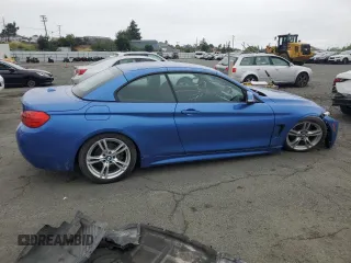 2015 BMW 4 Series 428i with VIN WBA3V7C54FP771931, listed as a Copart auction lot 53778755 with 51,411 mi miles and Salvage Title. Bid and sale history available at carsss.com. Image 3.