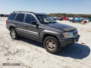 2003 Jeep Grand Cherokee Laredo with VIN 1J4GW48SX3C589100, listed as a Copart auction lot 49986745 with 247,687 mi miles and Salvage Title. Bid and sale history available at carsss.com. Image 4.