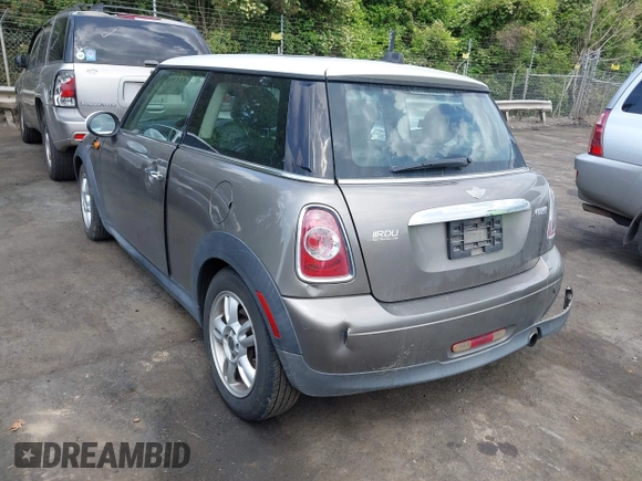 2013 MINI Hardtop with VIN WMWSU3C58DT681631, listed as a IAAI auction lot 42130063 with 177,182 mi miles and . Bid and sale history available at DreamBid. Image 3.