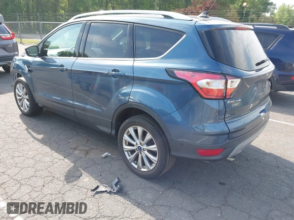2018 Ford Escape Titanium with VIN 1FMCU9J92JUB01162, listed as a IAAI auction lot 42495112 with 96,280 mi miles and . Bid and sale history available at DreamBid. Image 3.