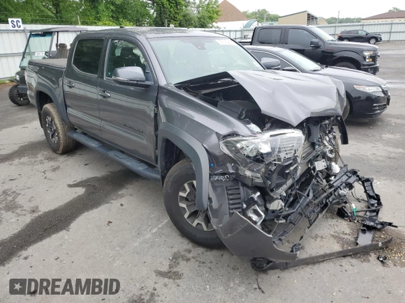 2021 Toyota Tacoma SR z VIN 3TYCZ5ANXMT050566, wystawiony jako Copart lot #57315615 z przebiegiem Nie podano mil oraz Szkoda całkowita • Salvage title. Historia ofert i sprzedaży dostępna na DreamBid. Obrazek 4.