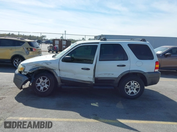 2005 Ford Escape XLT with VIN 1FMYU03165KA93495, listed as a IAAI auction lot 41821975 with 202,475 mi miles and . Bid and sale history available at DreamBid. Image 14.