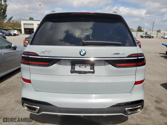 2023 BMW X7 xDrive40i with VIN 5UX23EM06P9M76099, listed as a Copart auction lot 54166385 with 67,400 mi miles and Clean Title. Bid and sale history available at carsss.com. Image 6.