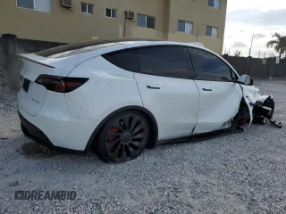 2024 Tesla Model Y Performance with VIN 7SAYGDEF3RF050704, listed as a Copart auction lot 45512455 with 15,539 mi miles and Salvage Title. Bid and sale history available at DreamBid. Image 3.