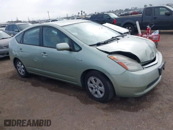2006 Toyota Prius z VIN JTDKB20U963131145, wystawiony jako IAAI lot #41857847 z przebiegiem 113 251 mil mil oraz . Historia ofert i sprzedaży dostępna na DreamBid. Obrazek 1.