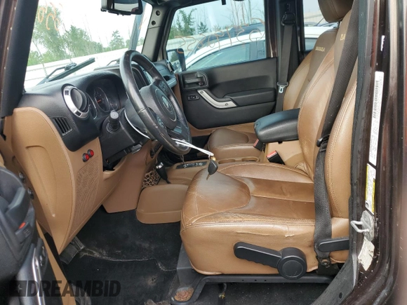 2013 Jeep Wrangler Unlimited Sahara with VIN 1C4HJWEG0DL658138, listed as a Copart auction lot 63792855 with Not provided miles and Clean title. Bid and sale history available at DreamBid. Image 7.