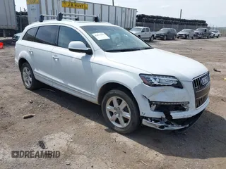 2015 Audi Q7 Premium Plus z VIN WA1LGAFE8FD017092, wystawiony jako IAAI lot #42073593 z przebiegiem 105 593 mil mil oraz . Historia ofert i sprzedaży dostępna na DreamBid. Obrazek 1.